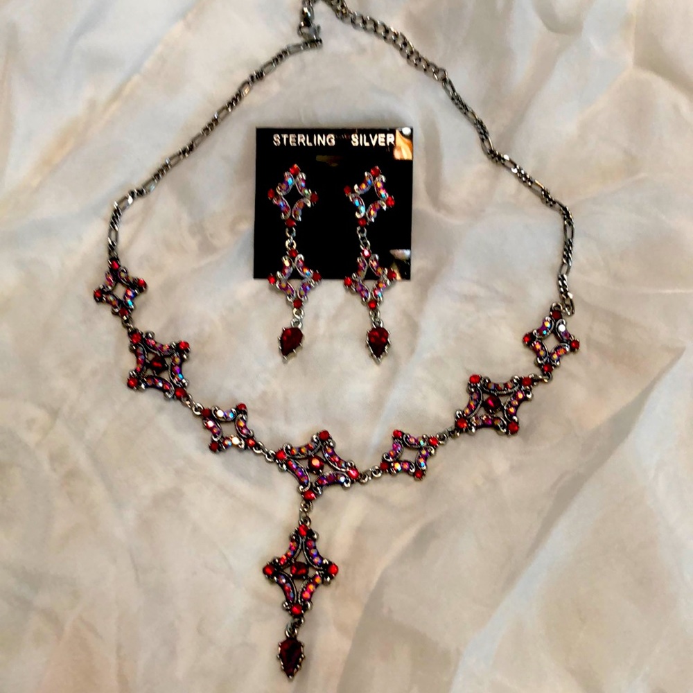 Sterling silver burgundy and rhinestone earrings and necklace.